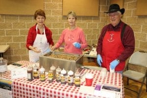 John Nishimuta and wife (far L) make some of the best bar-b-que in the area... and that's a fact!
