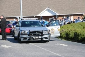 Honor Guard procession lead by Union County Sheriff Mack Mason